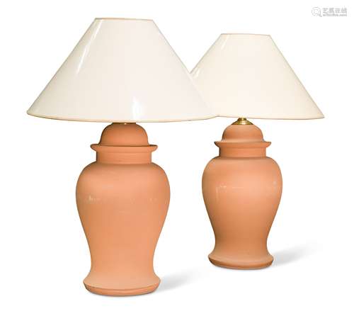 A pair of modern terracotta baluster vase lamps,