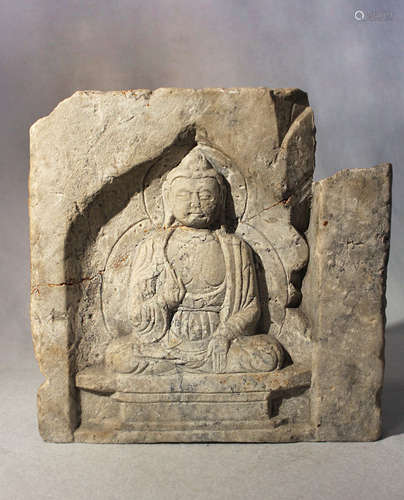 A Chinese white stone architectural panel in relief with a meditating Buddha, in Tang Dynasty style,