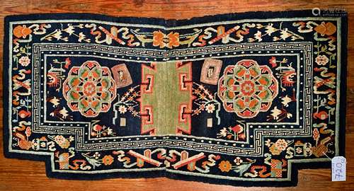 A Tibetan wool saddle bottom rug Makden, circa 1900-1930