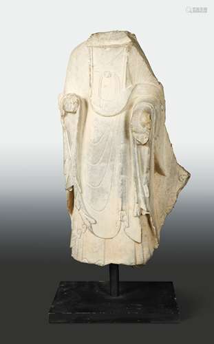 A Chinese limestone Buddhist deity, torso only, perhaps Wei Dynasty,