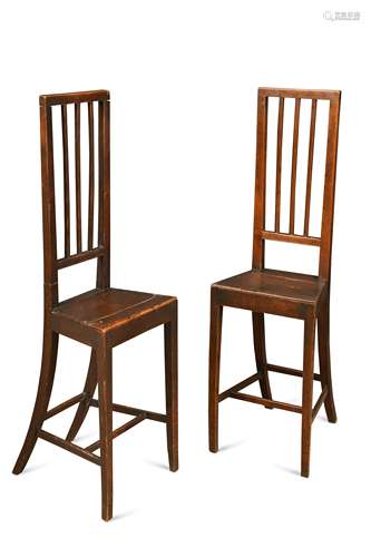 A pair of fruitwood stick back correction chairs, mid 19th century,