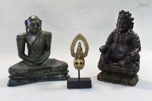 A Sri Lankan bronze of a seated Buddha, Kandy Period, 18th century,