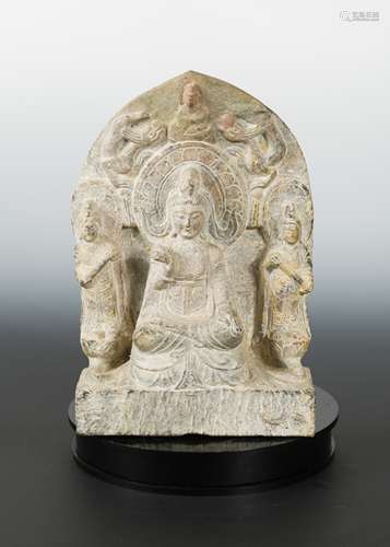 A Chinese grey stone Buddhist triad stele with aureole, in Wei Dynasty style,