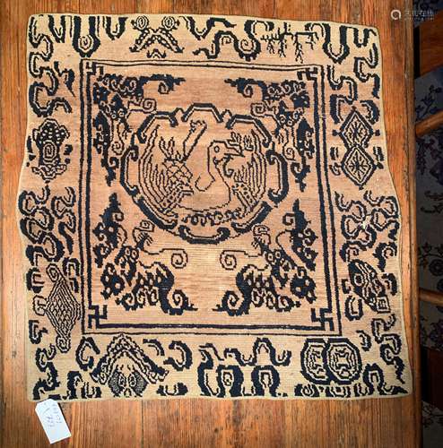 A Tibetan wool single seat rug, circa 1900-1930