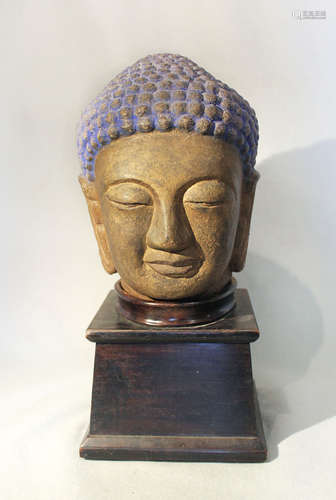 A carved stone head of a Buddha, 20th century in Tang Style