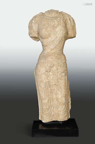 A Chinese white marble standing Avalokiteshvara, torso only, Tang Dynasty style,