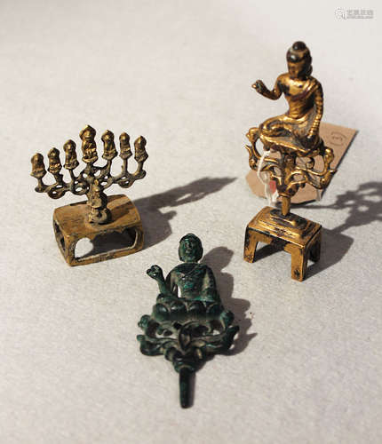 Three Chinese small bronze and gilt bronze Buddhist figures, in Wei Dynasty style,