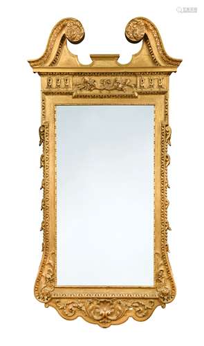 A giltwood and gesso wall mirror in the manner of William Kent,