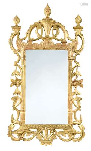 A carved and pierced giltwood wall mirror, 19th century,