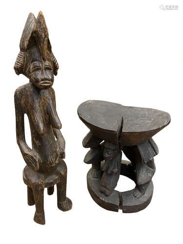 An African tribal stool with oval seat,