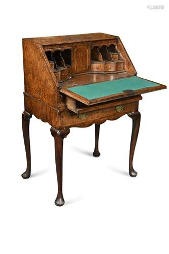 A George I style miniature mulberry bureau on stand,