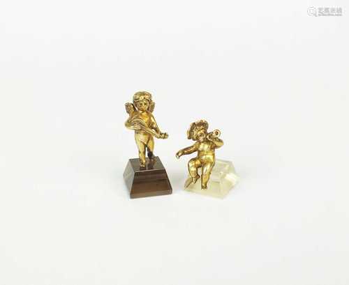 Two miniature models of putto