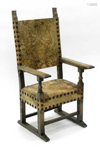 A 19th century, 17th century style, Iberian elbow chair, with a painted hide and studded back and