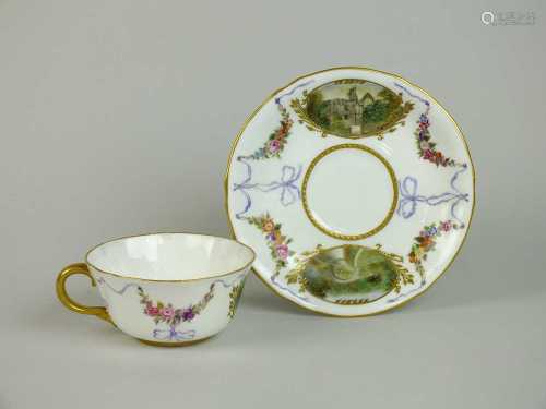 A Derby teacup and saucer painted by J. Horton