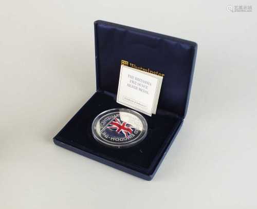 An Elizabeth II five ounce silver medal