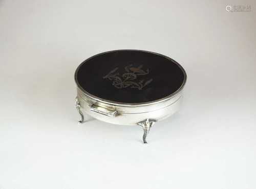 An early 20th century silver and tortoiseshell mounted dressing table box