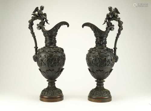 A pair of Rennaissance revival bronze wine ewers, 19th century