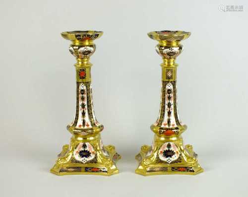 A pair of Royal Crown Derby imari candlesticks