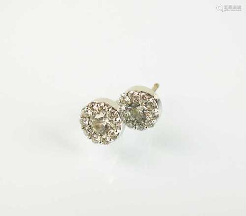 A pair of diamond stud cluster earrings