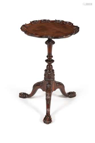 A George II carved mahogany candle stand