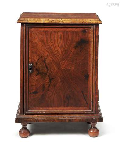 A Queen Anne figured walnut collector's cabinet