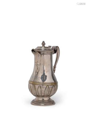 A silvered brass baluster jug