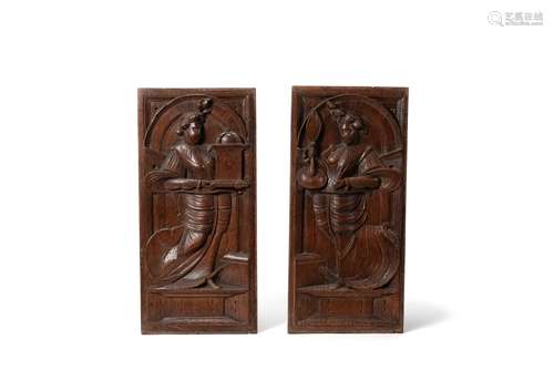 A pair of Flemish sculpted oak allegorical panels