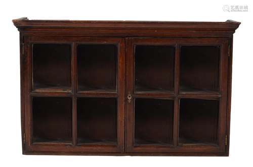 A George II oak hanging wall cabinet