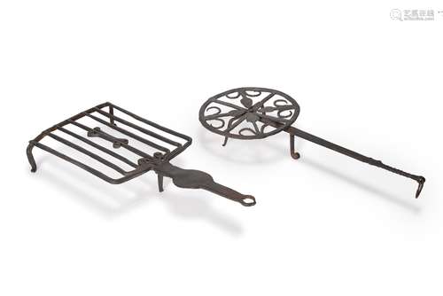 Two wrought iron trivet stands