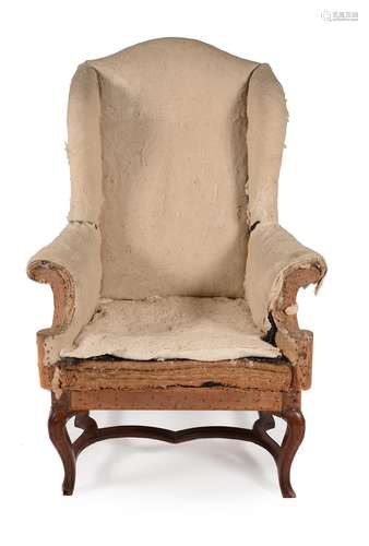 A walnut wing armchair