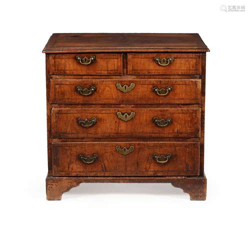 A George II walnut and crossbanded chest of drawers