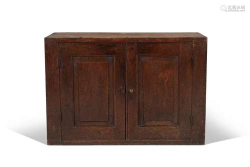 A George II oak and elm hanging cupboard