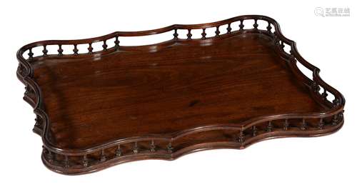 A George III mahogany serpentine tray