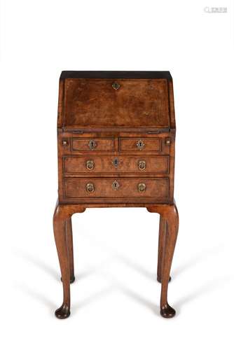 A George I walnut and crossbanded bureau