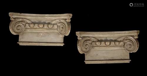 A pair of painted plaster Ionic order capitals