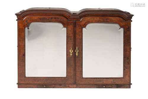 A George I walnut cabinet