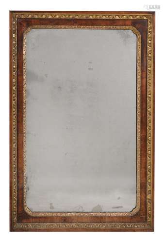 A George II walnut and parcel gilt wall mirror