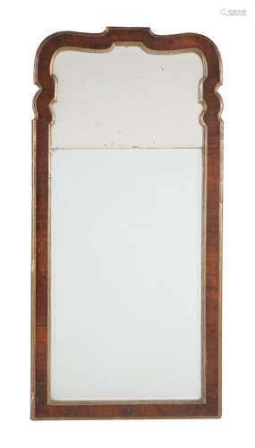 A George II walnut and parcel gilt wall mirror