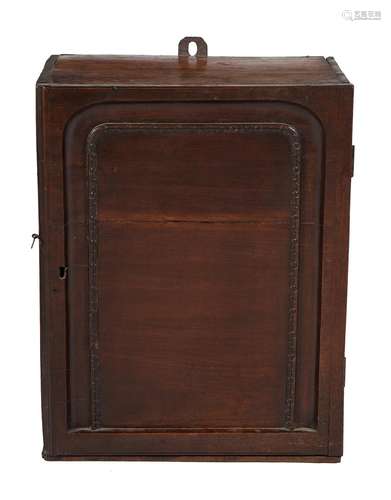 A George II mahogany and elm hanging wall cabinet