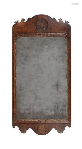 A George II walnut and parcel gilt wall mirror