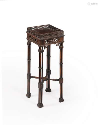 A mahogany urn stand