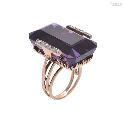 An amethyst and diamond dress ring