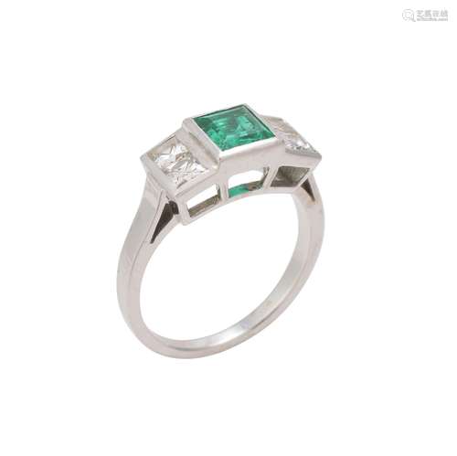 A five stone emerald and diamond ring