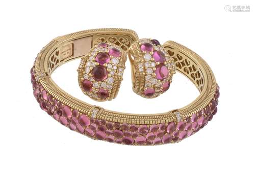 A pink tourmaline and diamond bangle and earrings by Judith Ripka