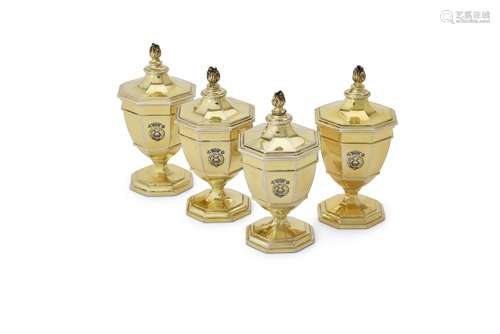 A set of four silver gilt octagonal vase shape salt cellars by Carrington & Co.