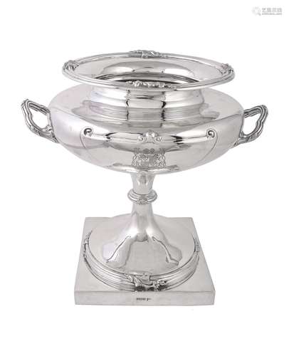 A silver twin handled trophy cup by Walker & Hall