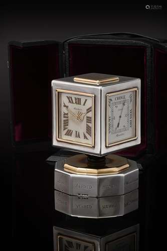 Cartier, a silver, gold and onyx mounted desk clock, perpetual calendar and weather station