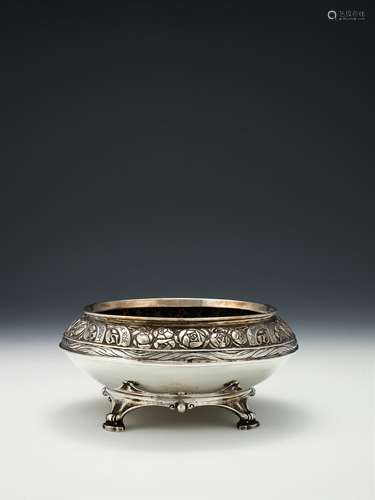 An Edwardian Arts and Crafts hammered silver rose bowl by Omar Ramsden & Alwyn Carr