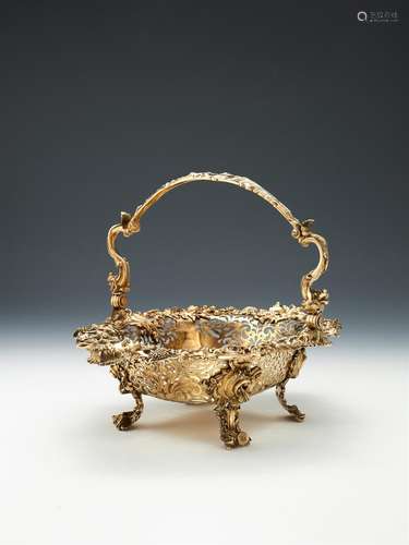 A late George III silver gilt shaped oval bread basket by J. E. Terrey & Co.