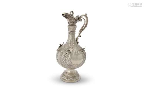 An over-sized late Victorian silver Armada pattern claret jug by Sibray